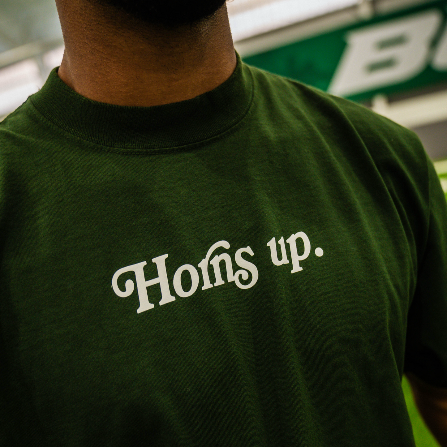“Horns up.” Tee (Forest)